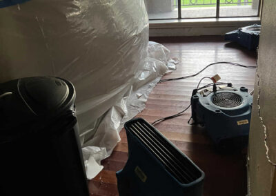 Hallway Upstairs Drying Out - Notice the Damaged Wood Floor